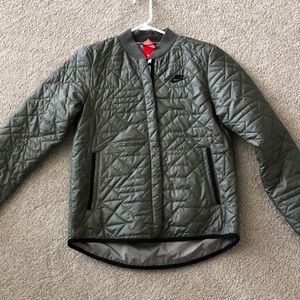 Olive green Nike puffer jacket